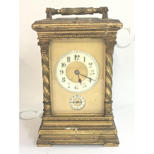 1298 - A late 19th century brass carriage clock with repeat strike movement. No key. In need of restoration... 