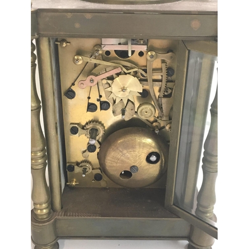 1299 - A mid 20th century carriage clock with porcelain panels decorated with nude women. This lot cannot b... 