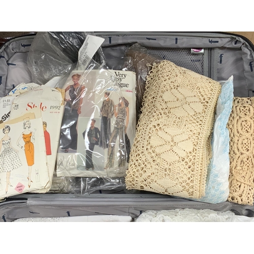 2059 - A suitcase full of lace work, edging, beaded dress section, dress designs etc..