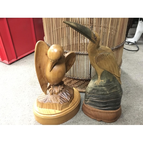 2060 - Carved wooden bird figures including a pelican. 29 and 37cm tall. Postage category C