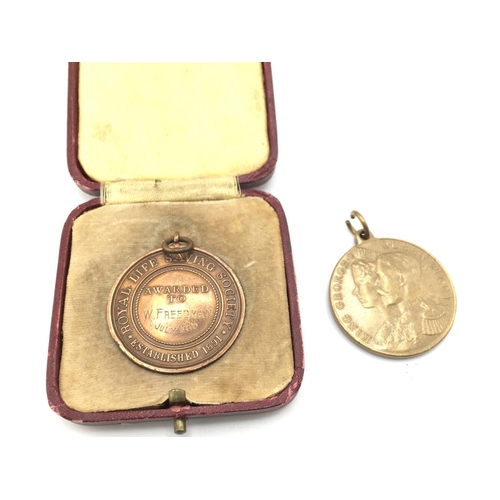 705 - A cased Royal life saving society medal and a 1911 coronation medal.Postage B