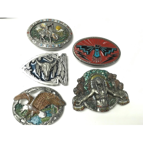 706 - A collection of 9 belt buckles with a new leather belt. Postage B