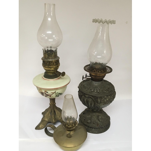 721 - A Victorian Spelter oil lamp an opaque lamp and small brass lamp. (3) NO RESERVE