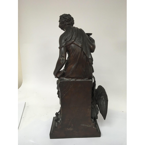 728 - A late 19th century bronzed metal Classical ornament of a female on a monument with an eagle height ... 