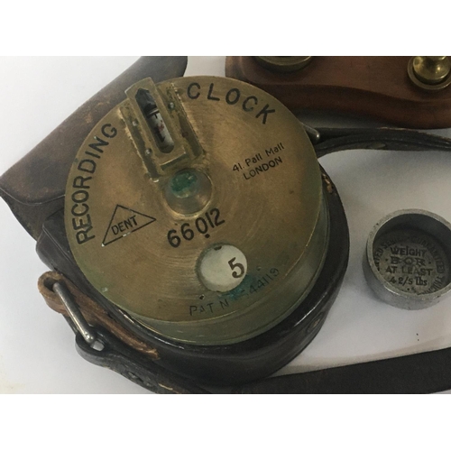 752 - A collection of items comprising a set of brass beam balance postal scales with weights a British ma... 