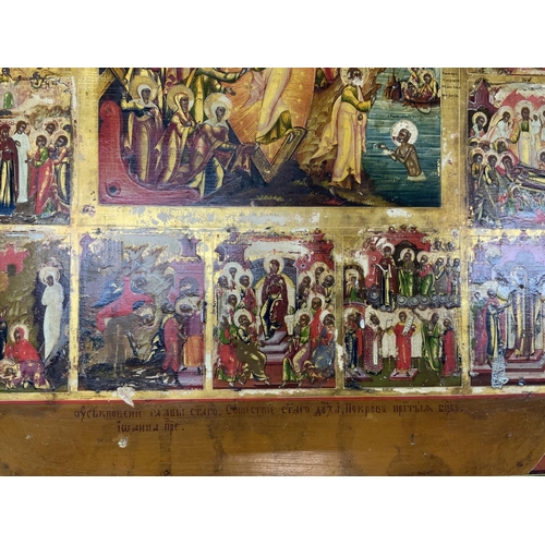 763 - A large 19th Century Russian wooden panel Icon depicting The Great Feasts and Scenes from the Gospel... 