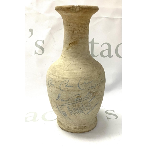 766 - An unusual earthenware pot, A Souvenir turned on stage during a performance of the musical âChu Ch... 