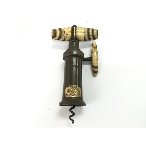 771 - A 19th century Dowler patent brass corkscrew with bone handle and bone ratchet sidearm. Approximatel... 