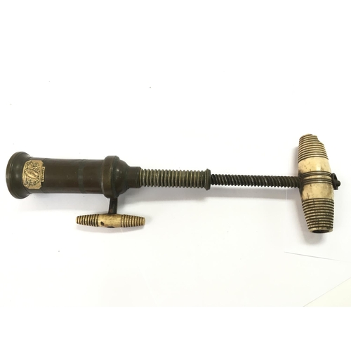 771 - A 19th century Dowler patent brass corkscrew with bone handle and bone ratchet sidearm. Approximatel... 