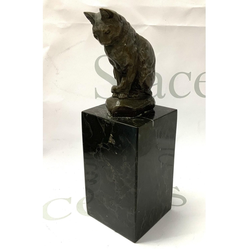 778 - A Bronze seated figure of a cat on a marble base signed Barye. (B)