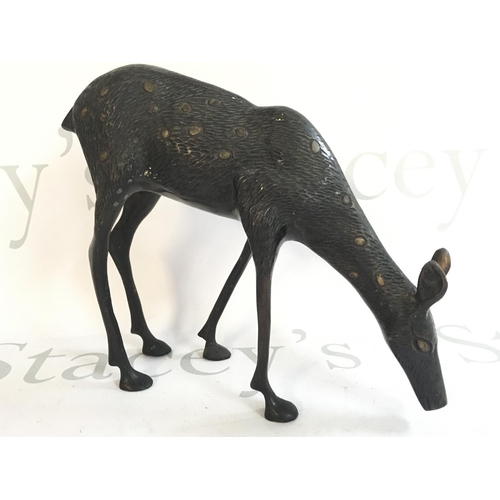 782 - A bronze fawn figure , postage category B