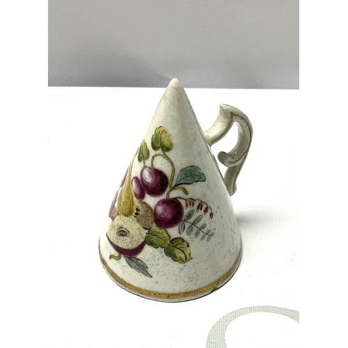 802 - A small possibly Chelsea porcelain candle snuff with hand painted fruit decoration. (Some restoratio... 