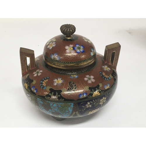 806 - A Quality Japanese cloisonn� jar and cover decorated with sprays of flowers. With raised... 