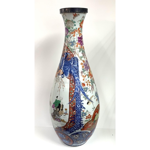 818 - A large 19thC Japanese Imari floor vase. 84cm. Some restoration. (D). (Previously owned and from the... 