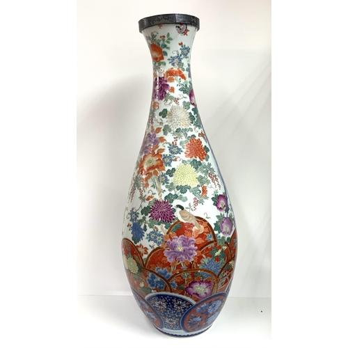 818 - A large 19thC Japanese Imari floor vase. 84cm. Some restoration. (D). (Previously owned and from the... 