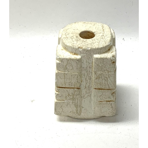 830 - A Chinese archaic form jade Kong. 6cm.