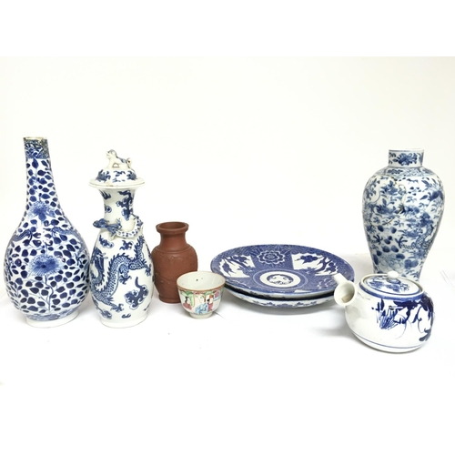 831 - A Collection of Chinese ceramics including blue and white plates and vases with dragon decoration. D... 