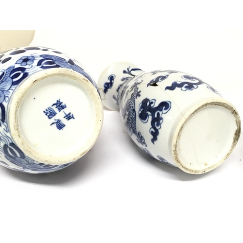 831 - A Collection of Chinese ceramics including blue and white plates and vases with dragon decoration. D... 