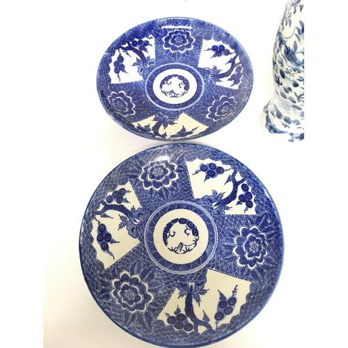 831 - A Collection of Chinese ceramics including blue and white plates and vases with dragon decoration. D... 