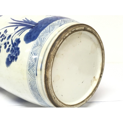 840 - A 19th century Chinese blue and white vase with pheasant and cherry blossom tree decoration. 47.5cm ... 