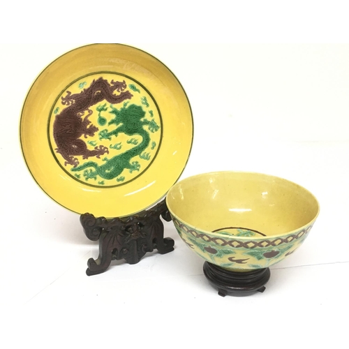 841 - Late 19th century Chinese yellow ground bowl and plate incised with green dragons and other decorati... 