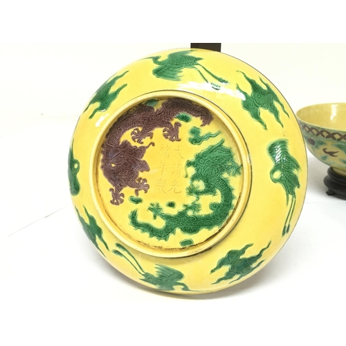 841 - Late 19th century Chinese yellow ground bowl and plate incised with green dragons and other decorati... 