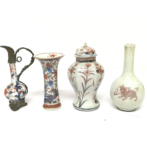 848 - Small Chinese vases including a three Buddhist lions vase and Imari vases. 12cm tall. This lot canno... 