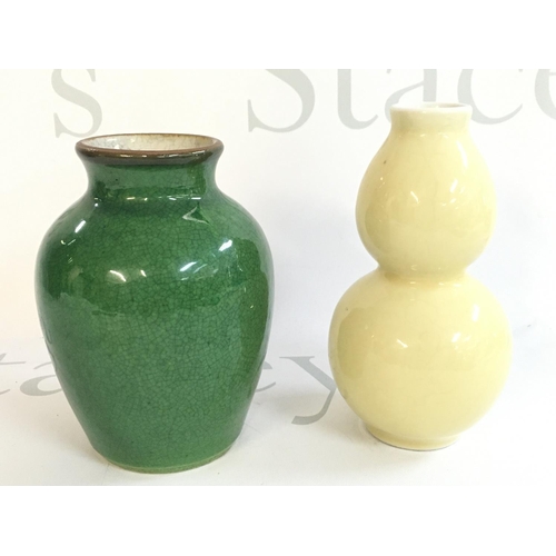 861 - Two small Chinese vases, a yellow gourd shaped vase and a green crackle vase. 12 and 13cm tall. This... 