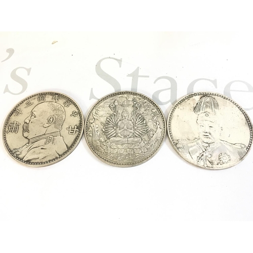 867 - Three large Chinese coins, 8.5cm wide approximately. Postage category A