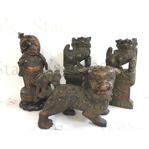 877 - A Collection of 19th & 20th century Chinese wooden carved Fu dog ornaments and a Buddha. Postage cat... 