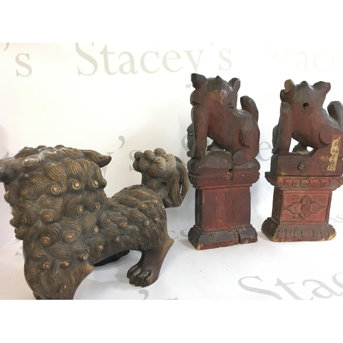 877 - A Collection of 19th & 20th century Chinese wooden carved Fu dog ornaments and a Buddha. Postage cat... 