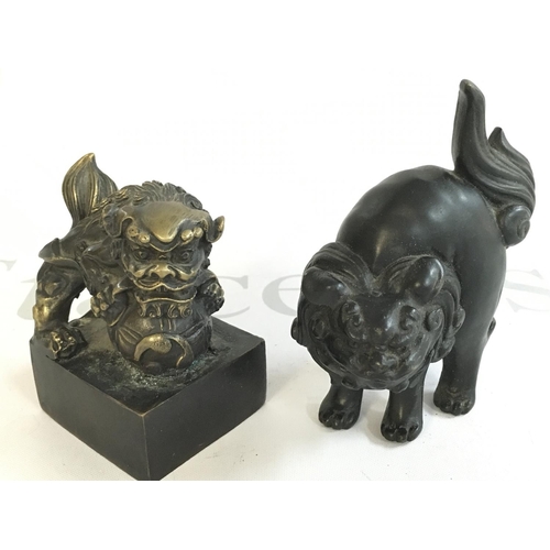 878 - Chinese bronze Fu Dogs , 11cm tall. Postage category B