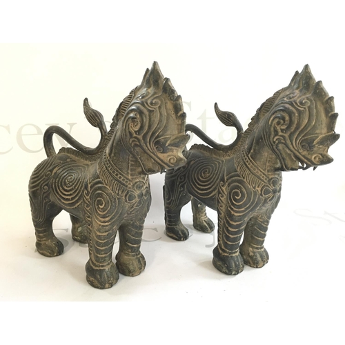 880 - Two bronze temple dog Thai figures, 20cm tall. Postage category B