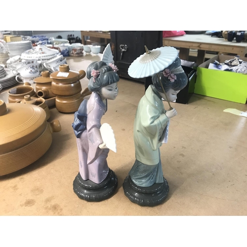 904 - Two Lladro figures of oriental lady's. 30cm high. Postage D. NO RESERVE