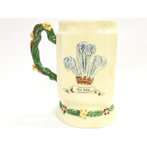 910 - A crown Devon porcelain musical Llwyn On jug. No obvious damage or restoration This lot cannot be po... 