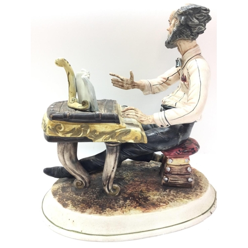 912 - A Capodimonte Pianist figure, 30cm tall. This lot cannot be posted. NO RESERVE