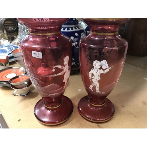 917 - A pair of Victorian style cranberry vases . NO RESERVE