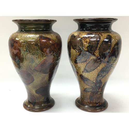 940 - A pair of Royal Doulton autumnal foliage vases and a bowl. Bowl 20cm in diameter, vase 22cm tall. No... 