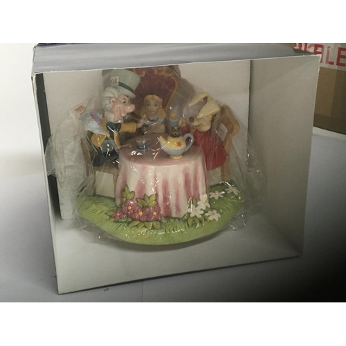 941 - A Royal Doulton boxed as new Disney Showcase figure group The Mad Hatters Tea Party. limited edition... 