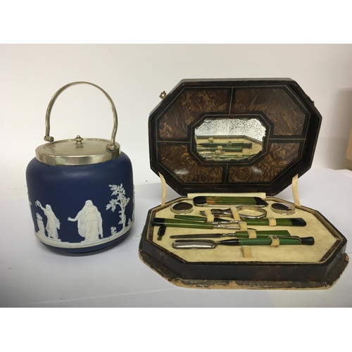 947 - A Wedgwood biscuit barrel and a cased Art Deco design manicure set. (2) NO RESERVE