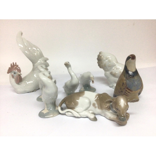 951 - WITHDRAWN - A collection of Lladro animals and birds chickens a calf a Partridge and geese no obviou... 