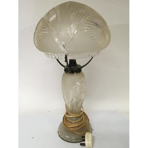 957 - A Quality cut glass table lamp with a dome shape shade with hob-star pattern and shaped edge. No obv... 