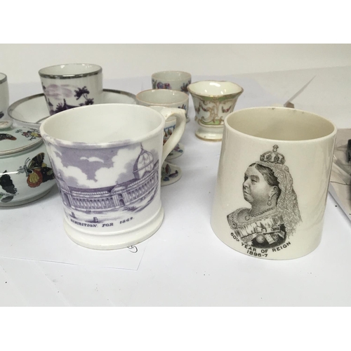 969 - A Victorian mug transfer decorated with a view of the 1862 international Exhibition. Other examples ... 