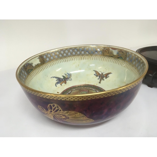 971 - A Quality Wedgwood lustreware bowl decorated with butterflies and panels of oriental buildings. The ... 