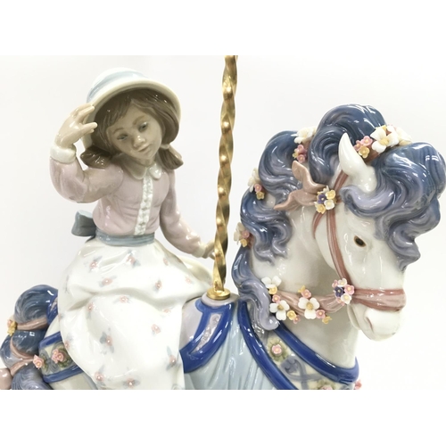 975 - A Lladro girl on a carousel horse porcelain figure. Some flowers missing however no obvious large da... 