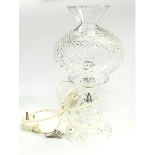 976 - A Waterford cut glass lamp, 35cm tall. This lot cannot be posted