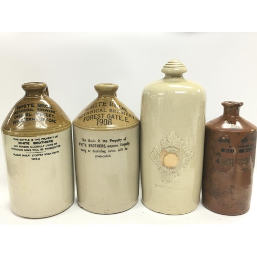 981 - A Collection of stoneware bottles including 20th century Botanical brewers century White Bros bottle... 