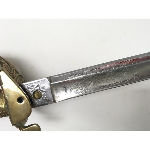 1496 - A naval officers dress sword with a brass hilt, lion head pommel, shagreen grip. 94cm total length. ... 