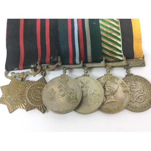 1533 - A collection of various war medals including British Hors De Combat line of duty medal, US armed for... 