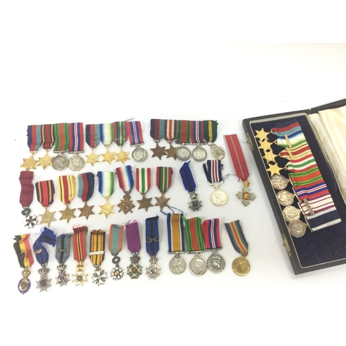 1536 - A collection of miniature war medals including Belgian and British medals. Postage category B